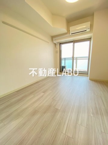 プレサンスOSAKA DOMECITY クロスティの居間・リビング