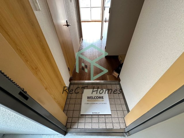 土井ハイツ北条口の玄関