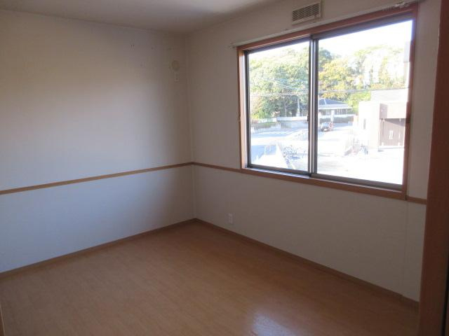 コーラルコート１号館の居間・リビング|洋室