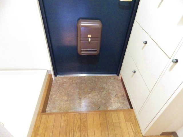 ノーブル・イズミの玄関