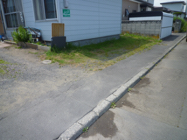 カネサマンションの駐車場