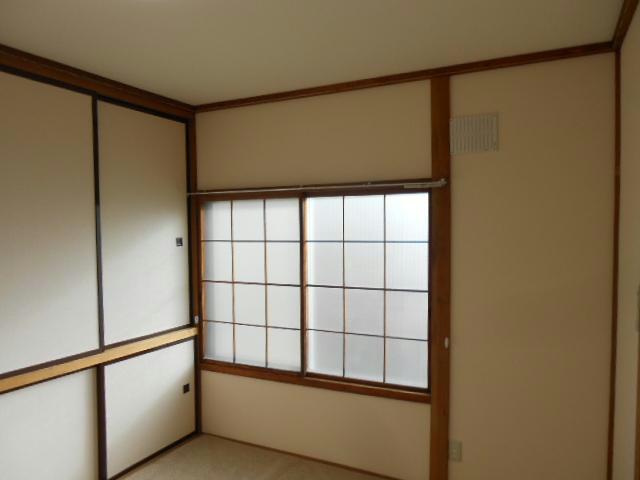 カネ山ハイツB（光和）の居間・リビング