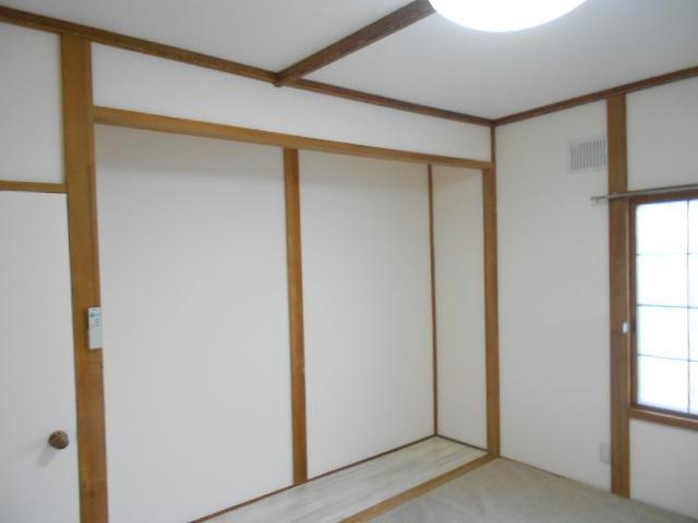 カネ山ハイツB（光和）の居間・リビング