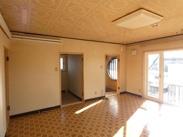 拓穂ハイツ（愛国東2-6-23）の居間・リビング