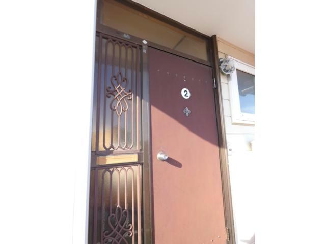 拓穂ハイツ（愛国東2-6-23）の玄関