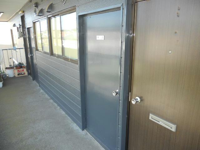 プレイス・ピア鶴野の玄関