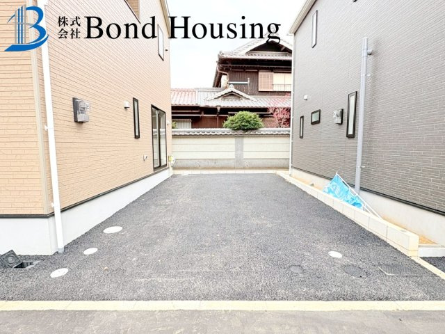 LDK15.7帖・駐車2台可　西区大沢1丁目　全4棟　3号棟の駐車場