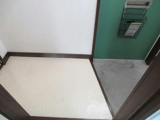 コーポ時計台の玄関