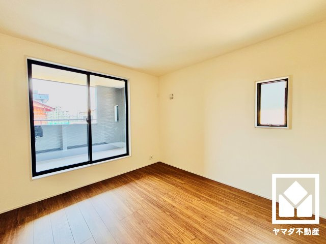 草津市草津町　2期　2号棟の寝室