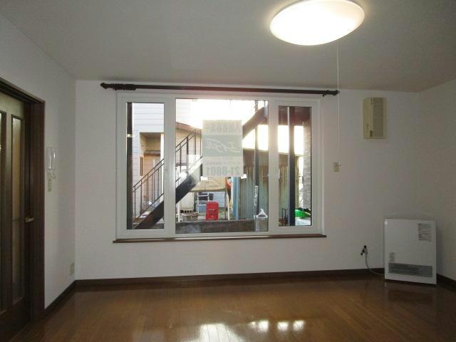 弥生ハイツＫＵＤＯＵＨ-Ⅱの居間・リビング