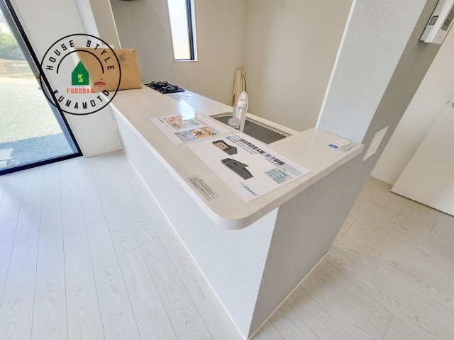 合志市合生第4-1棟（1号棟）　の内観：施工例|キッチンから立ち込める香りが今日の料理を期待させます。