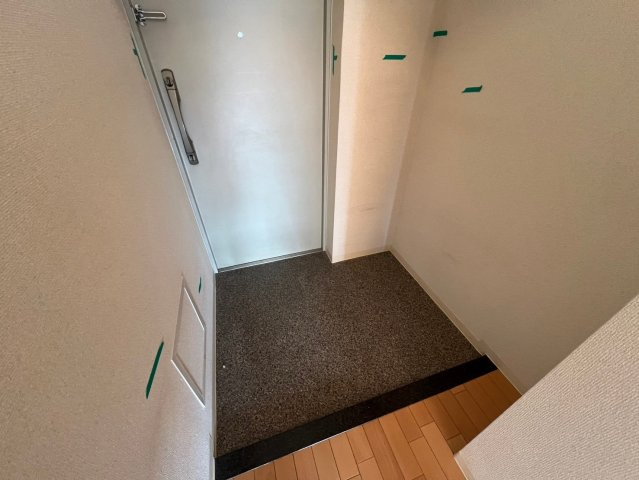 豊中市熊野町３丁目の賃貸マンションの玄関