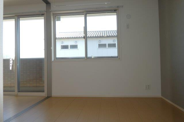 アースガーデンＳＯＪＡの寝室|洋室