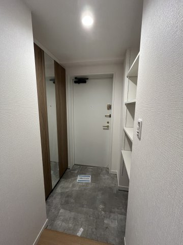 コスモつきみ野プライムコートの玄関