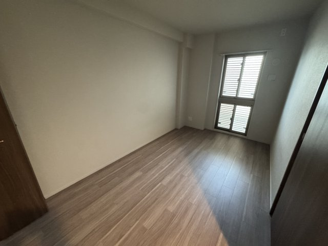 エスリード箕面船場阪大前の寝室