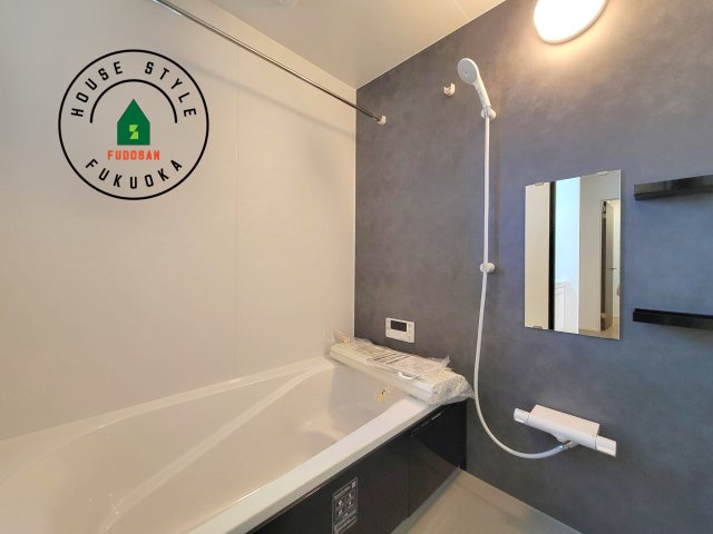 福津市福間南5丁目第5-3棟（2号棟）の内観：施工例|1日の疲れを癒してくれる広々バスルーム。雨の日のお洗濯にも大活躍な浴室乾燥機付です！
