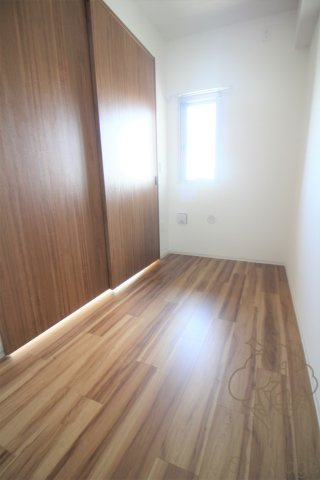 レジュールアッシュ三国本町の寝室