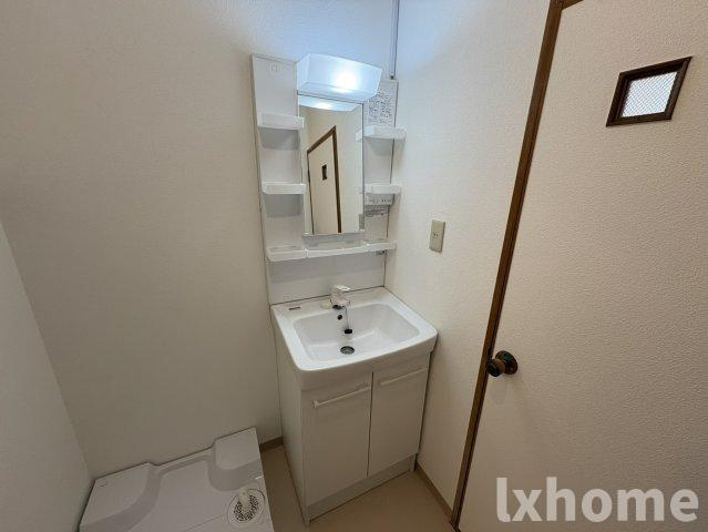 沢良宜東薩摩マンション2号棟の洗面所