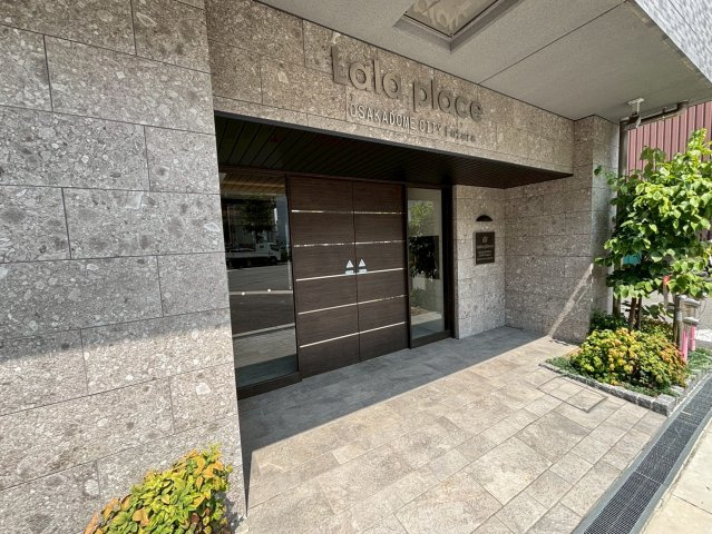 大阪市西区九条南３丁目の賃貸マンションのエントランス