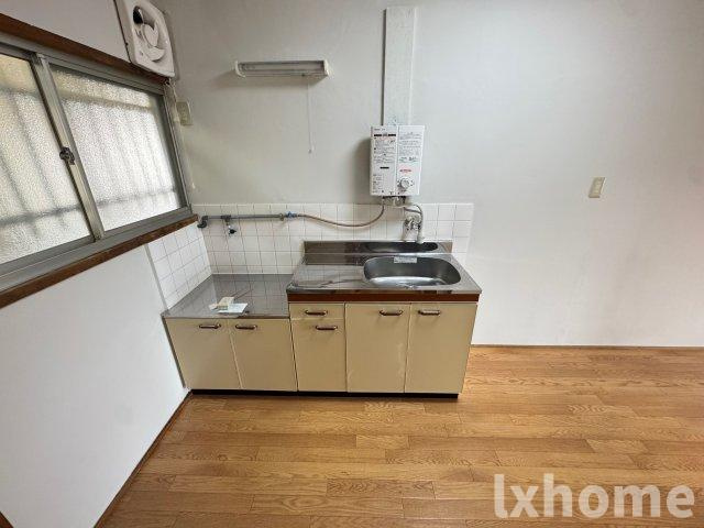 第１吉田文化のキッチン|コンパクトなキッチンで掃除もラクラク