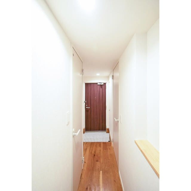 オーパスホームズ三田の玄関