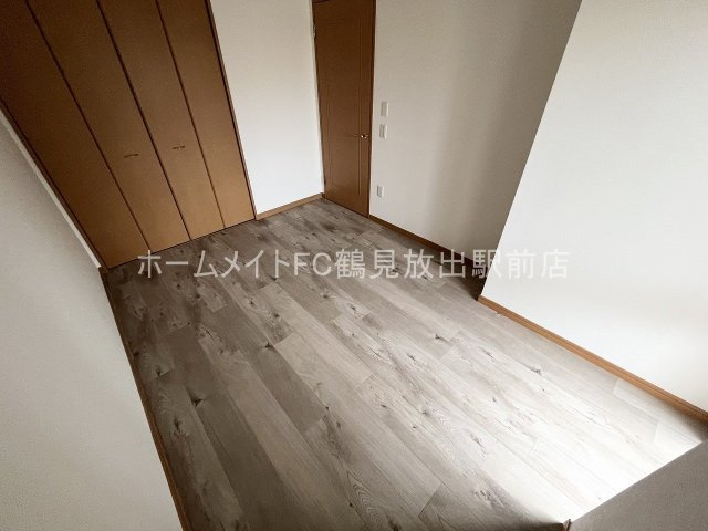 東大阪市森河内西２丁目の賃貸マンションの洋室
