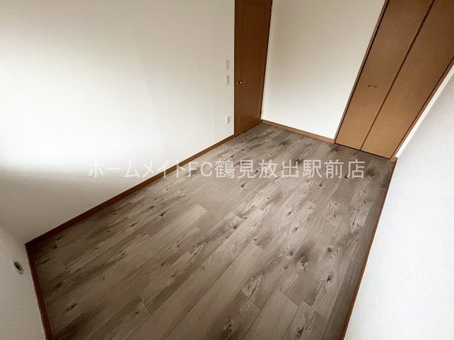 東大阪市森河内西２丁目の賃貸マンションの洋室