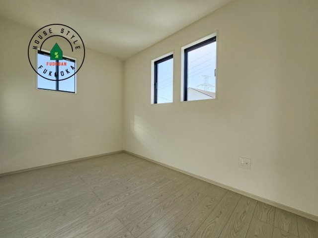 糸島市前原中央3丁目第1-3棟（2号棟）の内観：施工例|落ち着いた色調の洋室です。