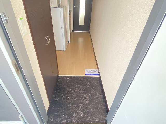 レオネクストアゼリアアークの玄関