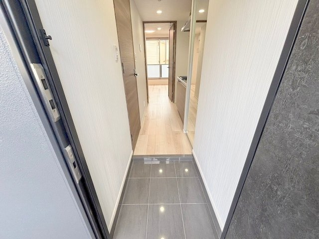 グランドロアール上新庄の玄関