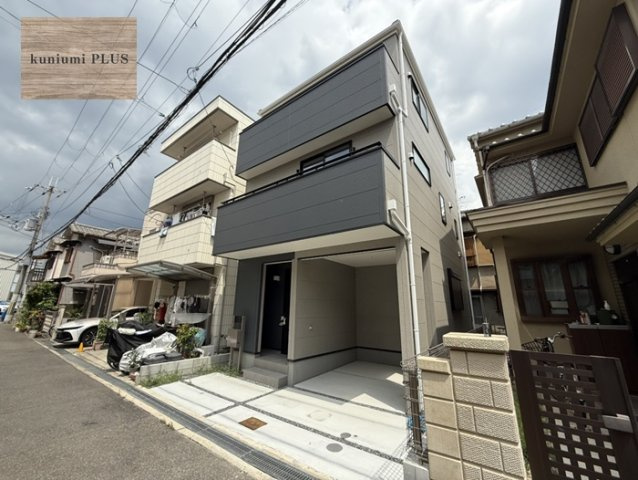 東大阪市新鴻池町　1号棟の前面道路含む現地写真