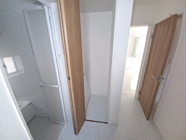 東松山市六軒町　中古戸建の収納|脱衣室の収納スペースです。