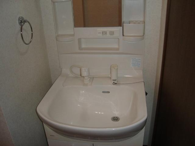 ロイヤルタムラさくら館の洗面所|洗髪洗面化粧台