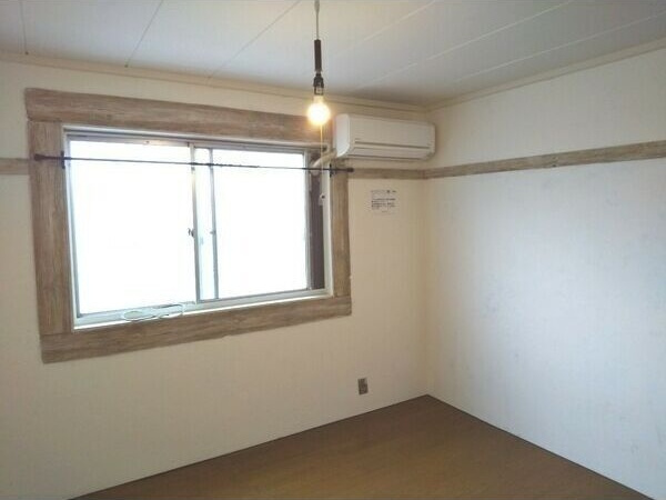 コンラッド長瀬の洋室