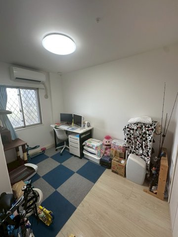 豊見城市字豊見城の中古マンションの洋室