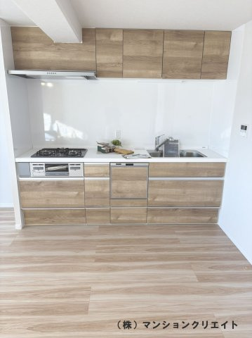 ダイアパレス西別院のキッチン|木目調のすっきりとしたキッチンです
