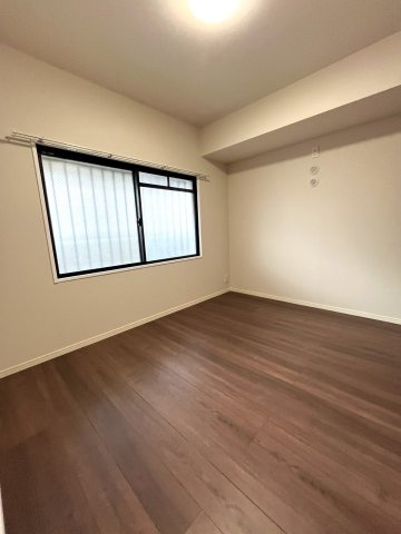 サングレート箱崎公園東の洋室