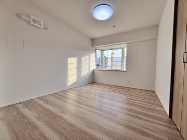 スワンマンション空港南の洋室