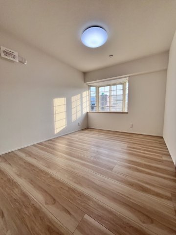 スワンマンション空港南の洋室