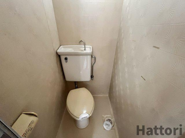 豊中市服部南町３丁目の賃貸マンションのトイレ