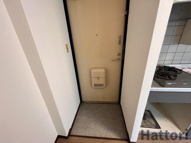 豊中市服部南町３丁目の賃貸マンションの玄関