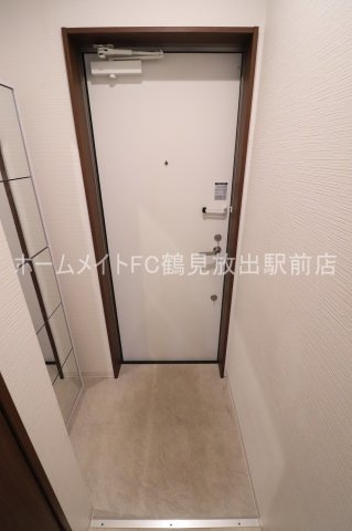 大阪市城東区永田３丁目のアパートの玄関