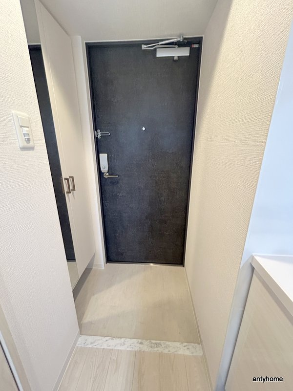 エスリード難波AGREA　仲介手数料無料の玄関