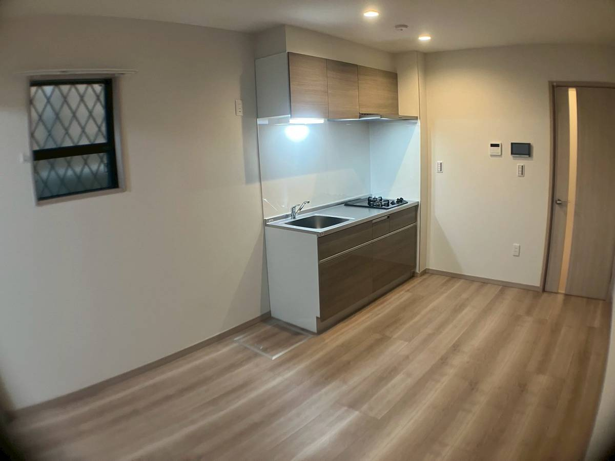 豊中市宝山町のアパートの居間・リビング