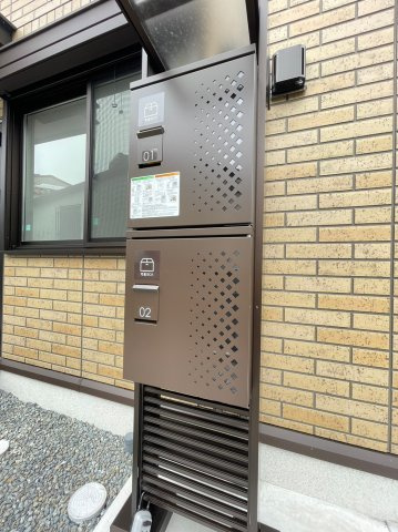 明石市魚住町金ケ崎のアパートのエントランス