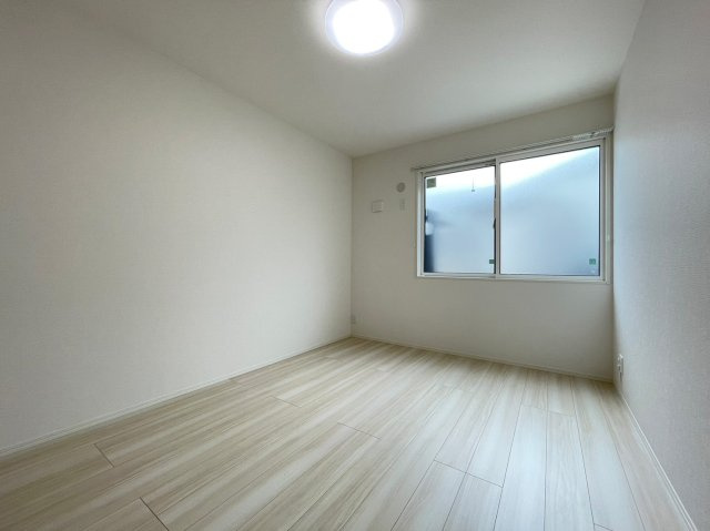 明石市魚住町金ケ崎のアパートの寝室