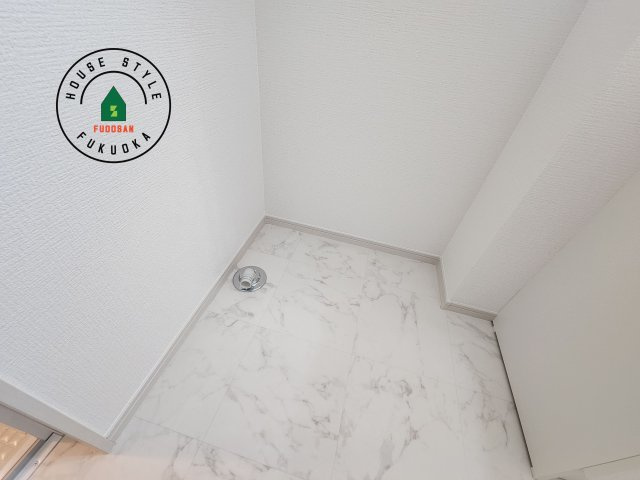 春日市春日原北町5丁目第1-2棟（1号棟）　の内観：施工例|ランドリースペースとなります。広々して有効的にご使用できます。 