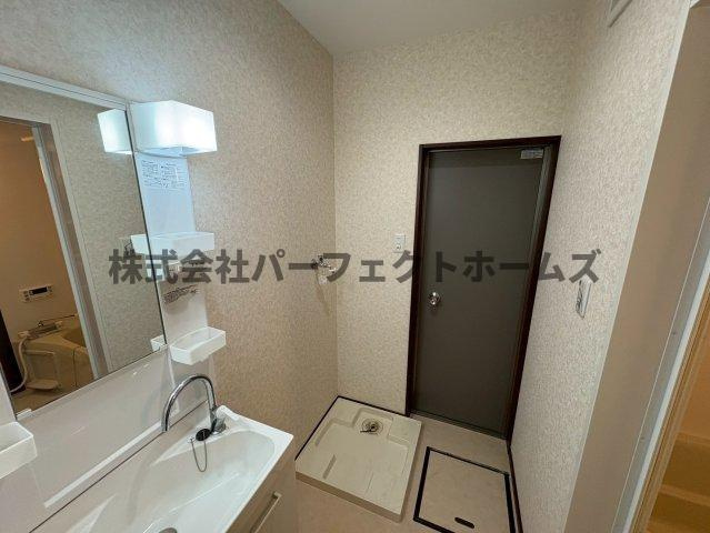 上島町テラスハウスの洗面所|広い洗面スペース