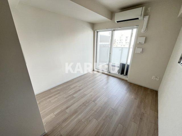 レジュールアッシュ都島ヴェルクレールの洋室|同物件別部屋の写真です。