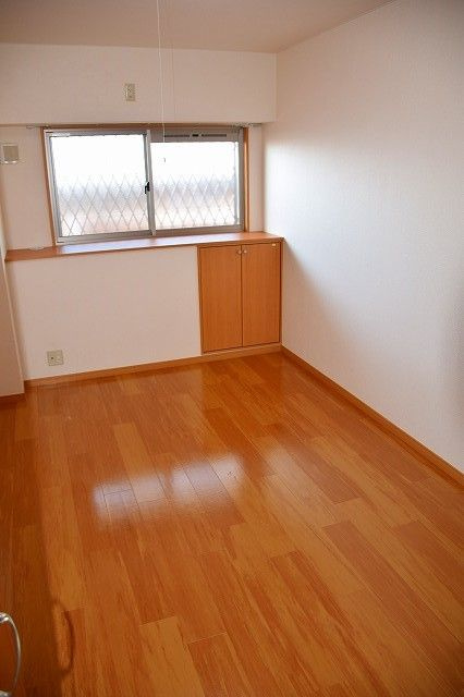 グランドールかさでらの寝室